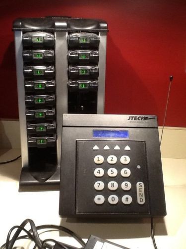 Jtech commercial transmitter and 20 slot pager tower w/12 pagers included for sale