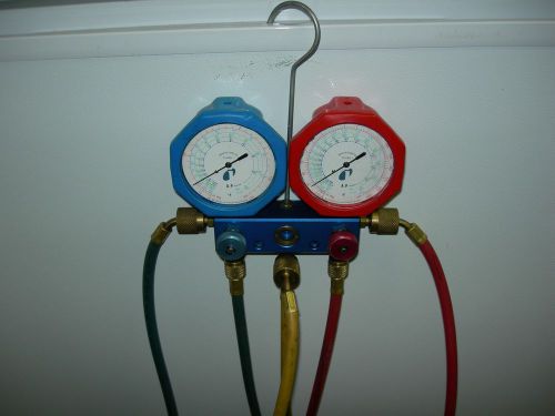 Lightly used HVAC Manifold Gauge set R-12, R-134a, &amp; R404a Yellow Jacket Hoses