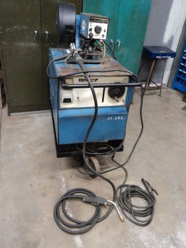 MILLER CP250TS MIG WELDER WITH WIRE FEEDER GUN CABLES METER WHEELS