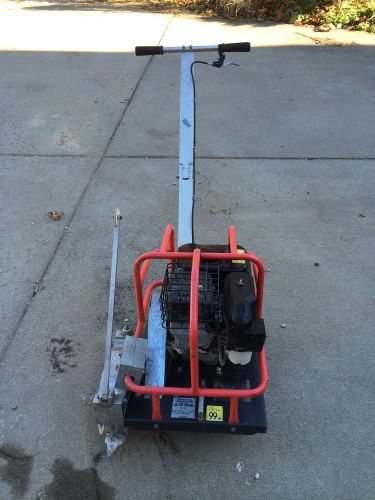 Husqvarna Soft-cut 150 concrete saw with diamond blade