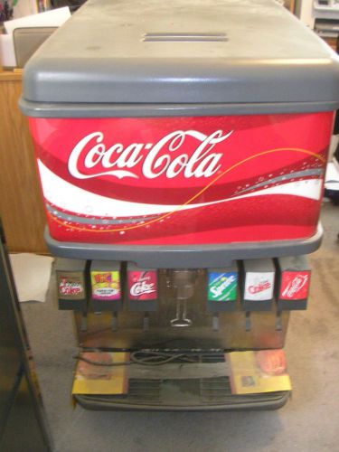 USED IMI CORNELIUS 6 HEAD SODA COKE FOUNTAIN W ICE DISP., CARBONATOR, SYRUP RACK