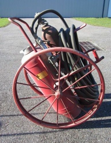 Ansul Red Line Wheeled Fire Extinguisher model K-150C, still charged.