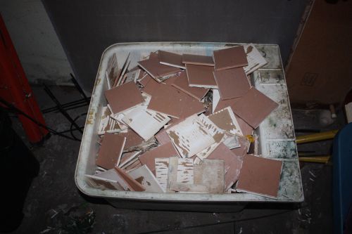 Huge laundry tub filled with ceramic tiles-