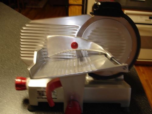 Berkel Model 825-E Electric Slicer. Used, Manual Driven.