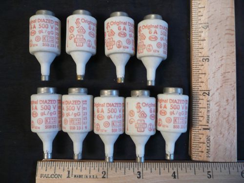 Lot of 9, 6 amp diazed  bottle fuses.