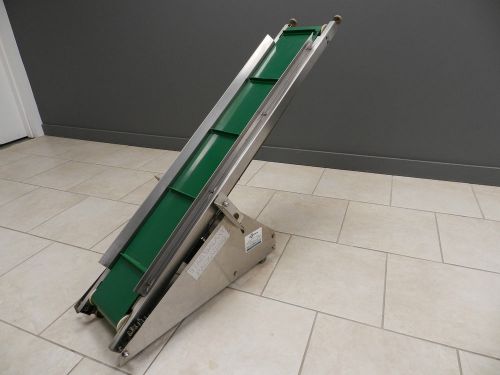 Cleated conveyor