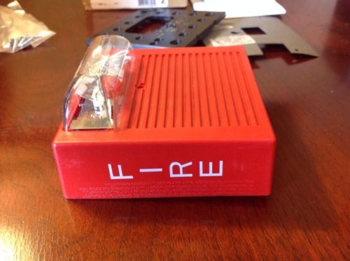 NEW COOPER WHEELOCK RED AUDIBLE FIRE ALARM STROBE 129025