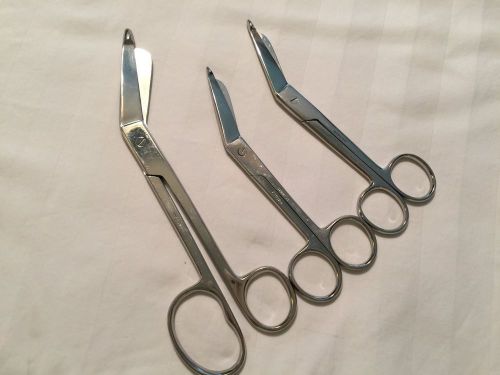 Medical Bandage Scissors. 1 Large, 2 medium.