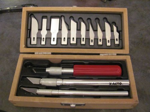 X-atco knife set, 3 knives,10 blades w/wooden  case,gently used,mint condition for sale