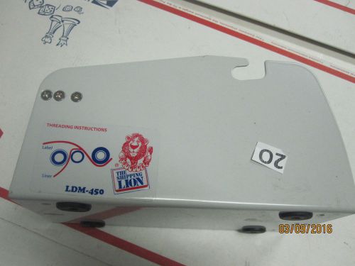 The Shipping Lion  STICKER DISPENSING MACHINE BARE