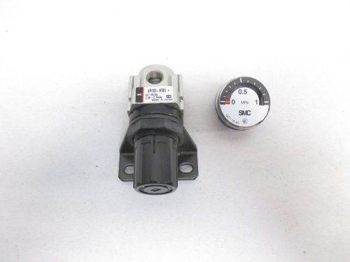 NEW SMC AR1000-M5BG .05-.7MPA 1/16 IN NPT PNEUMATIC REGULATOR D436044