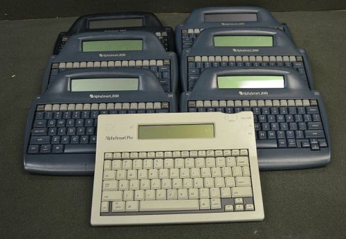 Lot of Seven (7) AlphaSmart Intelligent Devices Portable Word Processors