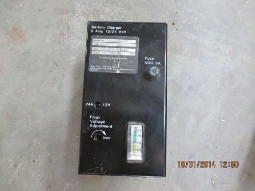 Onan cummins  2 amp 12 &amp; 24 vdc float battery charger  standby generators for sale