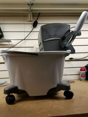 Quickie easy glide mop bucket with wringer for sale