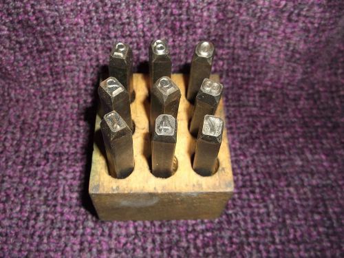 Vintage set of metal Numbers STAMPS wood case holder