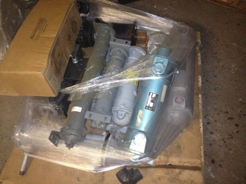 Pallet with 8 heat exchangers, some nib, some used, plus 2 electric motors for sale