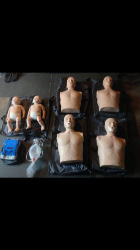 Set of cpr manakins and projector ready to teach! for sale