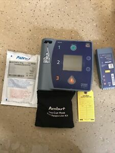 PHILIPS HEARTSTART FR2+ DEFIBRILLATOR, old pads and battery.  Tested &amp; Works