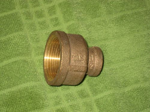 NIB LOT OF 2 -  1 1/4 INCH X 1/2 BRASS COUPLING LEADED