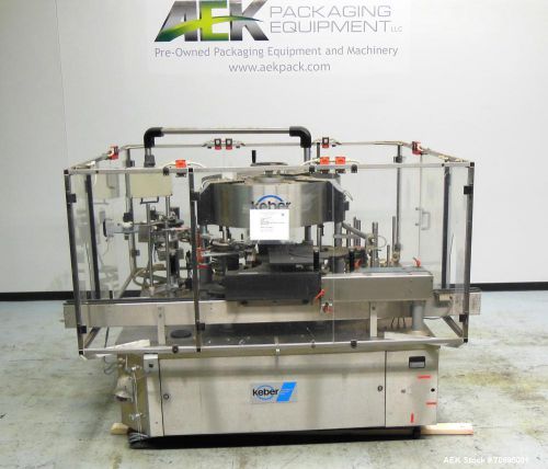 Used- Kosme Keber Kosmac Labeler, Model 6TS3E2+S. Previously used on 750 ml wine