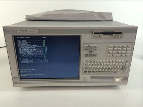 HP Agilent 16702A Logic Analyzer w/ 1x 16610A 2x 16701A 2x 16557D OPT. 003