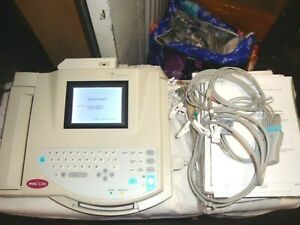 GE MAC 1200 INTERPRETIVE EKG ECG MACHINE W/6  EXTRA PAPER GREAT CONDITION