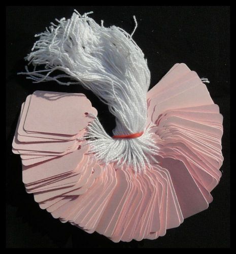 100 pink strung price tags 42 x 27 mm traditional tie on swing tags free post for sale