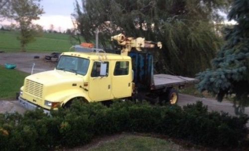 1998 international 4700 lp crew cab flatbed dump truck with crane for sale