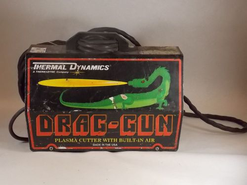 Thermal dynamics drag-gun plasma cutter w/ built-in air &amp; hoses (visible wear) for sale