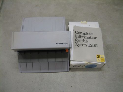 Xyron 1200 Laminating Machine w/one sample &amp; one new  adhesive roll