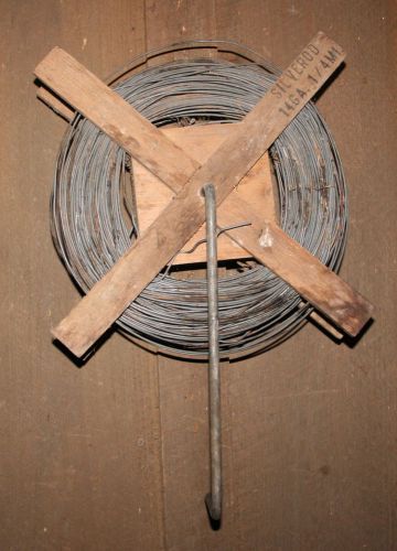 PARTIAL TO NEAR FULL SPOOL OF 14 GA. ELECTRIC LIVESTOCK FENCE WIRE UP TO 1/4 MI.