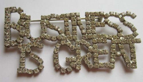 Big time bling business is great brooch for sale
