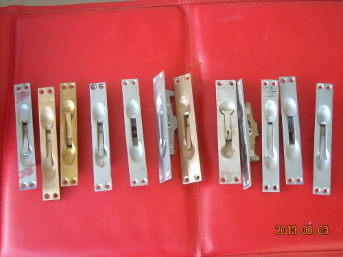 LOT OF NEW AND USED SPLIT DOOR RELEASE AND ASSOCIATED HARDWARE
