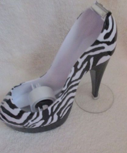 Stiletto (zebra) tape dispenser with roll of tape