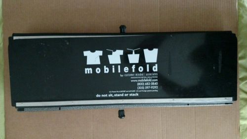 Mobilefold Mobile Shirt Folding Workstation Board I think its used ?