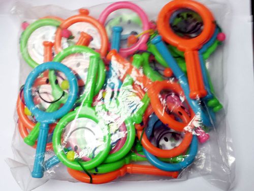 18 PIECE Party Favors Smiley Face shaking rattle Noise Maker Drum Toy wholeale