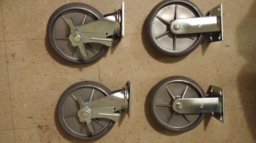 8 faultless swivel/rigid caster w/ hard rubber wheel &amp; top plate - 4 pack cart for sale