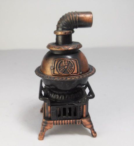 VINTAGE DIE CAST BRASS ( POT BELLY STOVE ) METAL PENCIL SHARPENER