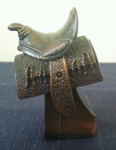 VINTAGE SADDLE DIE CAST METAL PENCIL SHARPENER MADE IN HONG KONG