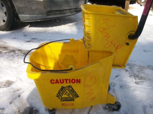 Rubbermaid  Mop Bucket And Ringer Used