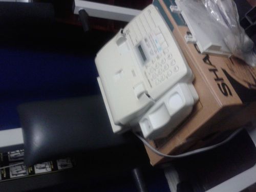 Sharp plain paper flacismile machine with phone new still in box