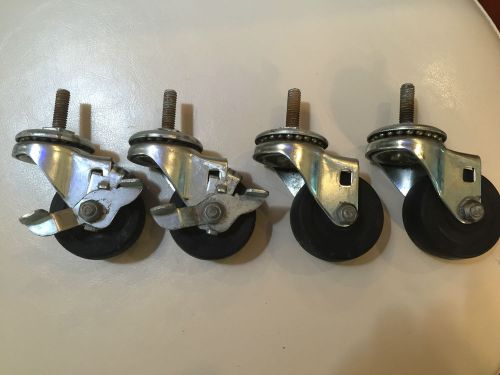 Set of (4) 2 Inch Casters - 2 with Brakes - Good Condition