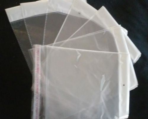 New qty:100 - 10 x 7 clear resealable poly cello cellophane bags w/ hang hole for sale