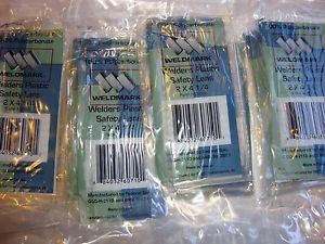 (12) NEW WELDMARK 2 X 4 1/4 WELDERS PLASTIC SAFETY LENSES