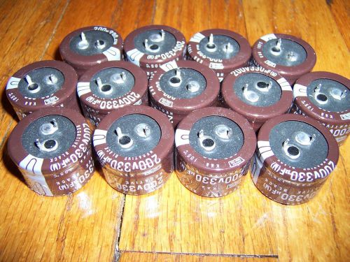 Lot of 13 nippon radial electrolytic capacitors 330uf 330 uf 200v 105*c for sale