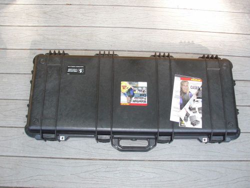 Pelican 1700 black gun or hard instrument case with wheels open box for sale