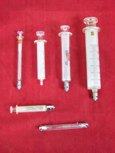 LOT OF 4 SYRINGES AND 1 SAMPLER WITH 2 NEEDLES 1CC TO 30CC ALL WORKING MEDICAL