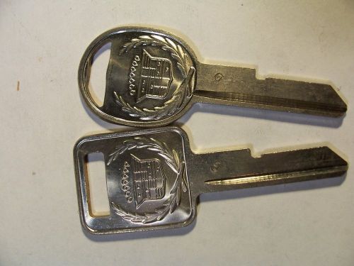 2 GM CADILLAC LOGO CREST NOS  B50C,B51D  BRIGGS &amp; STRATTON  KEY BLANK   UNCUT