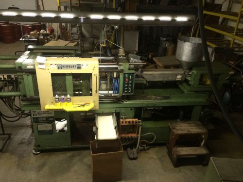 Newbury (1984) 150-ton 9.1 oz plastic injection molding machine for sale