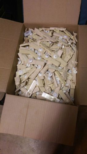 Box of 1000 Sensormatic Ultragator Tags with pins